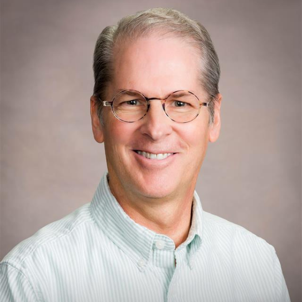 Headshot of Aaron McMillan, Business Systems Manager at RestoreInsure.