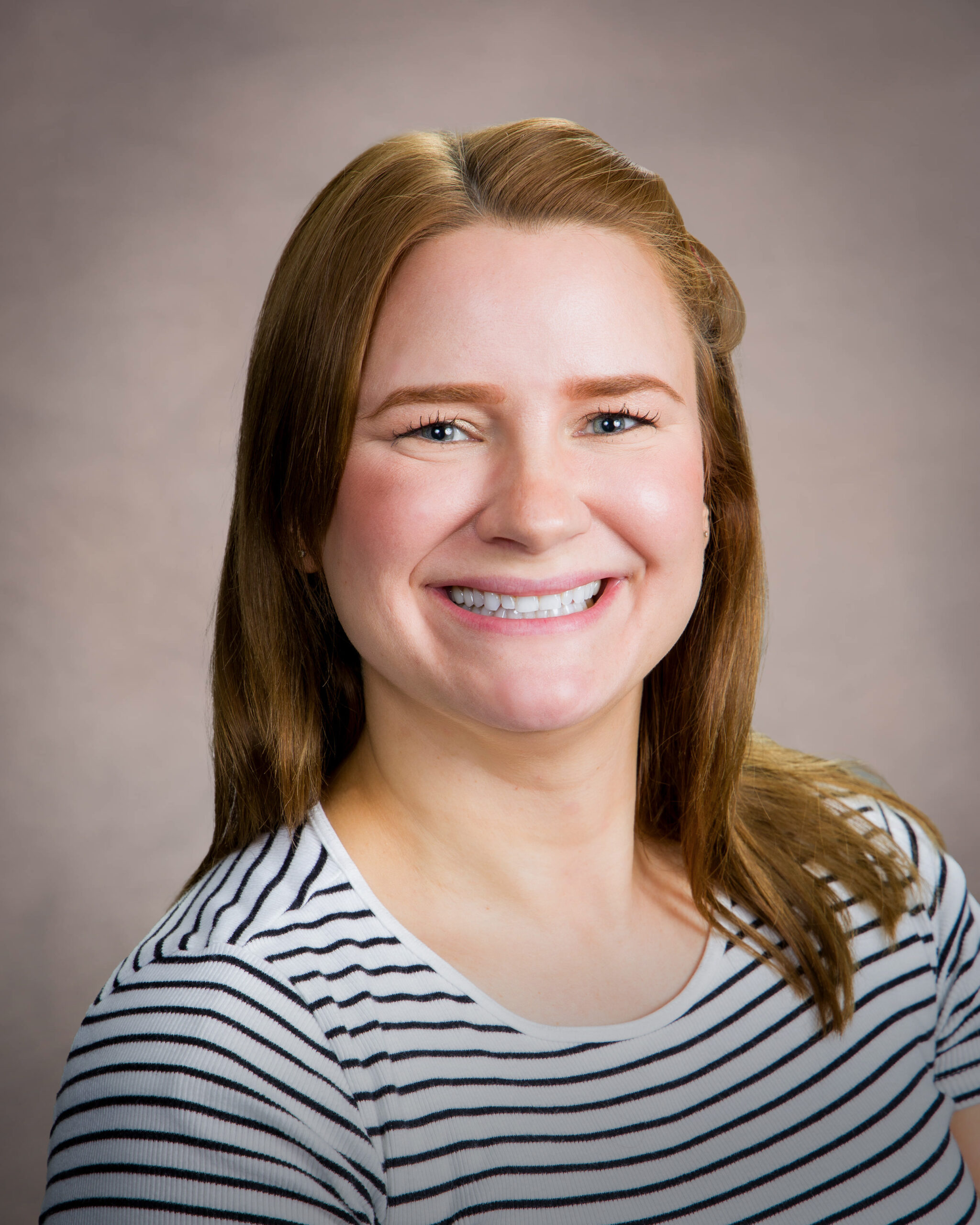 Headshot of Hailey Moore, Account Manager at RestoreInsure.