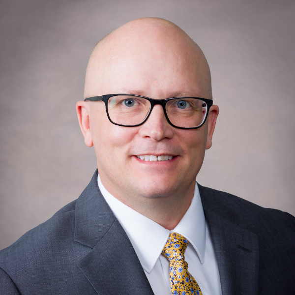 Headshot of Scott Anderson, Digital Marketing Manager at RestoreInsure.