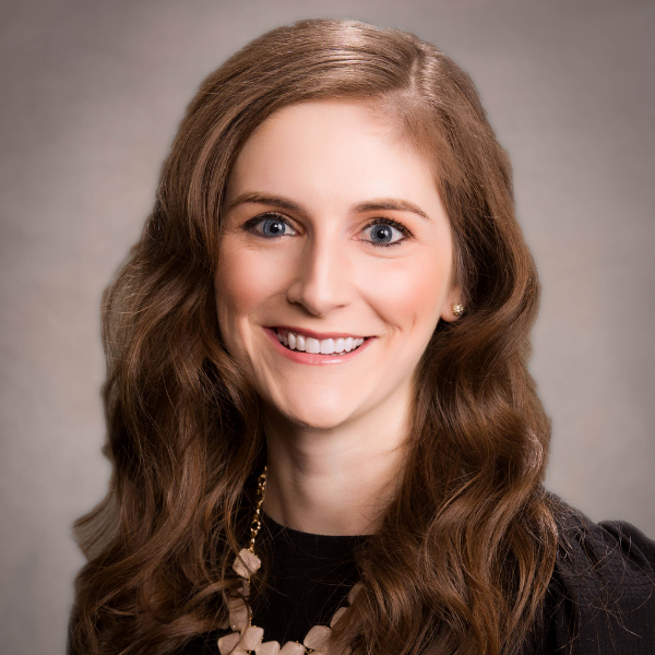 Headshot of Stephanie Jayes, Marketing Director at RestoreInsure.