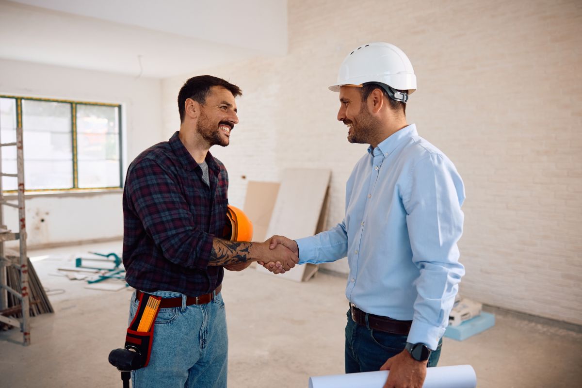 Restoration contractors performing water, fire, and contents work on different job sites.